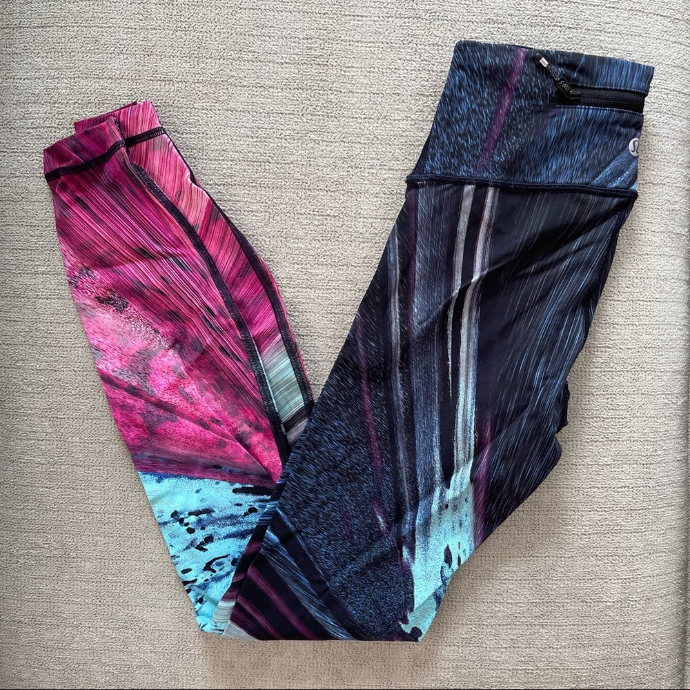 pink, turquoise, and navy patterned Lululemon swift speed high-rise tights 💝